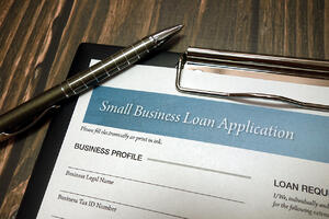 Small business loan application form on desk